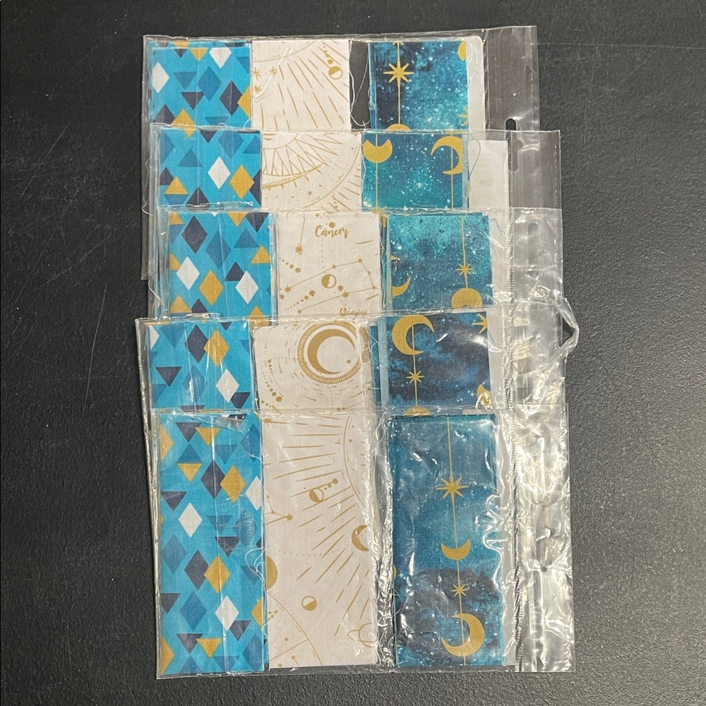 five packages of fabric strips